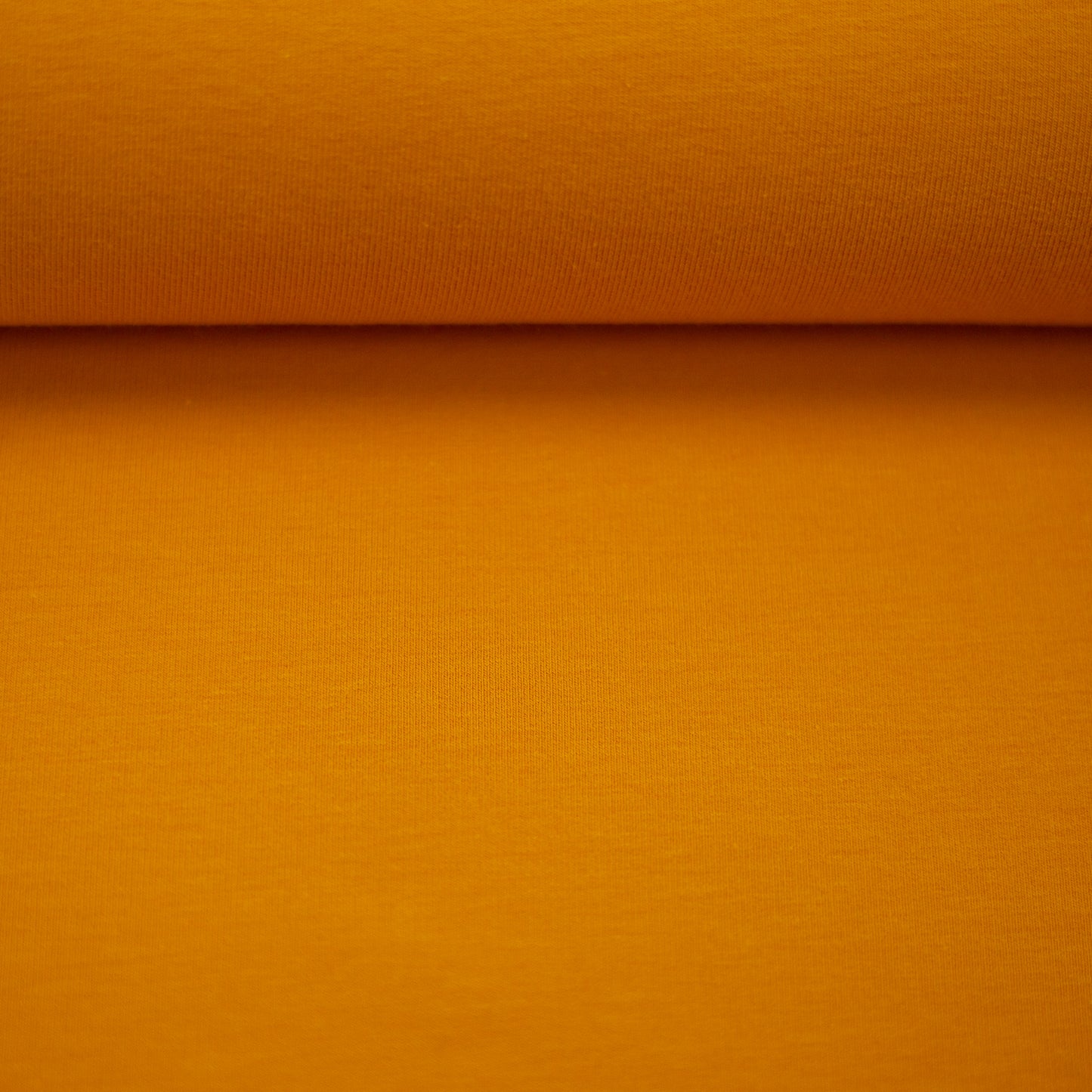 Cotton jersey, yellow gold color, 155 cm wide